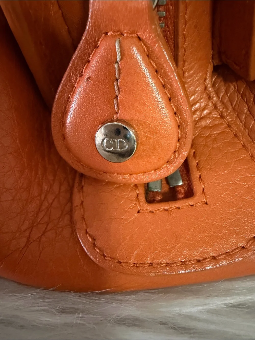 Dior Limited Edition Orange Leather Top-Handle Bag.
